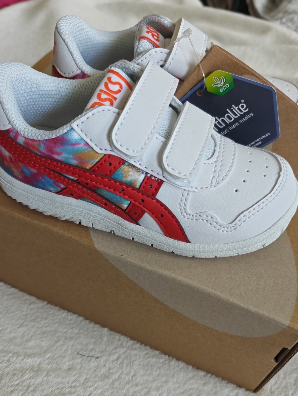 ASICS Kids White Sneakers with Red Stripes and Tie-Dye Accent